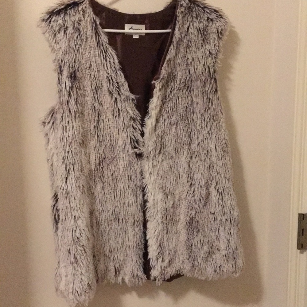 Faux fur vest with brown lining
